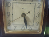 Vintage United Clock Corp Light Up Fire Place Self Starting Wood Cased Electric Mantle Clock Made in U.S.A.