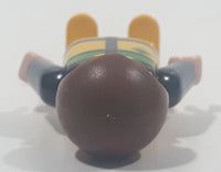 1992 Geobra Playmobil Small Brunette Child Black Pants Yellow Green Black Vest 2 1/8" Tall Toy Figure