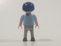 1995 Geobra Playmobil Small Blonde Boy Child Brown and Grey Overalls Light Blue Shirt Blue Hat 2 1/8" Tall Toy Figure