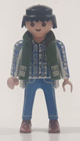 1994 Geobra Playmobil Black Hair Blue Pants White Blue and Grey Plaid Shirt with Olive Green Vest 2 3/4" Tall Toy Figure