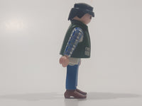 1994 Geobra Playmobil Black Hair Blue Pants White Blue and Grey Plaid Shirt with Olive Green Vest 2 3/4" Tall Toy Figure