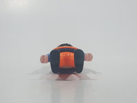 1990 Geobra Playmobil Black Hair Bright Orange Pants Blue Shirt Orange Vest 2 3/4" Tall Toy Figure