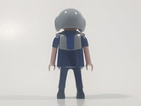 1997 Geobra Playmobil Brunette Hair Blue Uniform Grey Helmet Firefighter 2 3/4" Tall Toy Figure