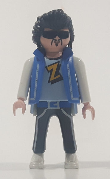 1992 Geobra Playmobil Black Hair Black Pants Light Blue and Grey Z Shirt with Blue Vest Rock Star Style 2 3/4" Tall Toy Figure