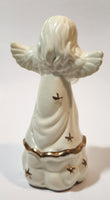 Angel Holding A New Born Baby 5" Tall Ceramic Figurine