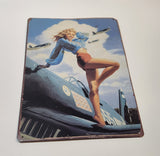 Pin Up Girl Standing On The Wing of a Vintage Airplane 7 3/4" x 11 3/4" Tin Metal Sign