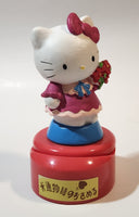 Hello Kitty 5 1/4" Tall Rotating Music Box Heavy Ceramic Resin Figure on Plastic Base