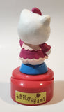 Hello Kitty 5 1/4" Tall Rotating Music Box Heavy Ceramic Resin Figure on Plastic Base