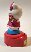 Hello Kitty 5 1/4" Tall Rotating Music Box Heavy Ceramic Resin Figure on Plastic Base