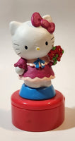 Hello Kitty 5 1/4" Tall Rotating Music Box Heavy Ceramic Resin Figure on Plastic Base