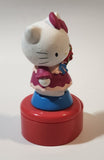 Hello Kitty 5 1/4" Tall Rotating Music Box Heavy Ceramic Resin Figure on Plastic Base