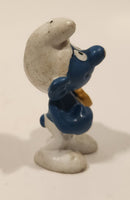 Vintage Peyo Bully Schleich Smurf With Biscuit Cookie 1 7/8" Tall PVC Toy Figure Made in West Germany