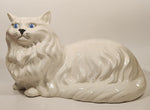 1980s Large Ceramic White Persian Cat with Blue Eyes Laying Ceramic Sculpture Ornament