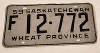 Vintage 1959 Saskatchewan Wheat Province Farm Vehicle Black Lettering Grey Vehicle License Plate Metal Tag 12 772