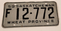 Vintage 1959 Saskatchewan Wheat Province Farm Vehicle Black Lettering Grey Vehicle License Plate Metal Tag 12 772