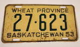 Vintage 1953 Saskatchewan Wheat Province Green Lettering Cream Vehicle License Plate Metal Tag 27 623