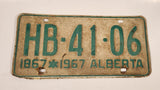 Vintage 1967 Alberta 1867-1967 Centennial Green Letters White Vehicle License Plate Tag HB 41 06