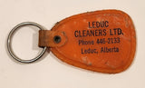 Vintage Leduc Cleaners Ltd. Leduc Alberta "Where Service Dwells and Cleaning Excels" Orange Plastic Fob Keychain Ring