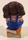 1984 OAA Panosh Place Cabbage Patch Kids Brown Hair with Pigtails Sitting On Books Reading A Book 2 1/2" Tall PVC Toy Figure