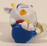 Doraemon Sitting Holding Gold Star 1 3/4" PVC Toy Figure