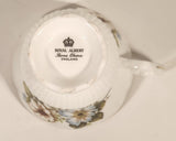 Vintage Royal Albert Bone China England Red Rose Buds with Light Blue and White Flowers Tea Cup & Saucer Set