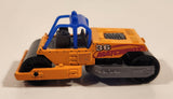 2000 Matchbox Earth Crunchers Road Roller Fluorescent Orange Die Cast Toy Construction Vehicle