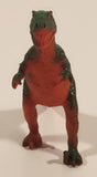 S.H. Orange and Green Raptor 2 3/4" Tall Dinosaur Toy Figure