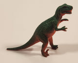 S.H. Orange and Green Raptor 2 3/4" Tall Dinosaur Toy Figure