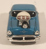 Muscle Machines 1956 Oldsmobile 88 Turquoise and White Die Cast Toy Car Vehicle