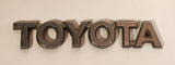 Toyota Plastic Metal Look Emblem Nameplate Badge Logo OEM