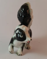 Vintage Porcelain Skunk Figurine with Tongue Out - Treasure Valley Antiques & Collectibles