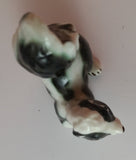 Vintage Porcelain Skunk Figurine with Tongue Out - Treasure Valley Antiques & Collectibles