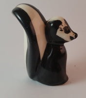 Vintage Dark Eyed Porcelain Skunk Figurine - Treasure Valley Antiques & Collectibles