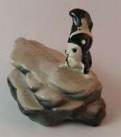 Vintage Porcelain Skunk on a Rock Figurine Has Crazing - Treasure Valley Antiques & Collectibles