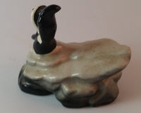 Vintage Porcelain Skunk on a Rock Figurine Has Crazing - Treasure Valley Antiques & Collectibles