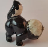 Vintage Porcelain Ceramic Playful Skunk Figurine - Treasure Valley Antiques & Collectibles