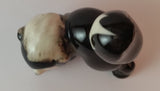 Vintage Porcelain Ceramic Playful Skunk Figurine - Treasure Valley Antiques & Collectibles