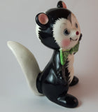 1950s Blushing Skunk with Green Polka Dot Bow Tie - Treasure Valley Antiques & Collectibles