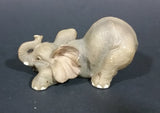 Elephant Figurine Laying Down with Trunk Upwards Marked ©97 WUI - Treasure Valley Antiques & Collectibles