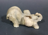 Elephant Figurine Laying Down with Trunk Upwards Marked ©97 WUI - Treasure Valley Antiques & Collectibles