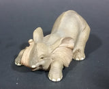 Elephant Figurine Laying Down with Trunk Upwards Marked ©97 WUI - Treasure Valley Antiques & Collectibles