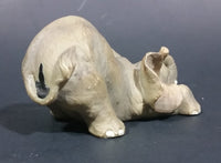 Elephant Figurine Laying Down with Trunk Upwards Marked ©97 WUI - Treasure Valley Antiques & Collectibles