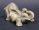 Elephant Figurine Laying Down with Trunk Upwards Marked ©97 WUI - Treasure Valley Antiques & Collectibles