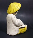 Vintage Chalkware Asian Child in Yellow Hat Sitting and Reading a Book Figurine - Treasure Valley Antiques & Collectibles