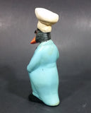 Vintage Black Duck in a Blue Suit Chef Cook Figurine Holding a Bottle of Bubbly - Treasure Valley Antiques & Collectibles