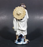 Vintage Balding Man with a Beard in a White Robe With a Tan Hat Ceramic Figurine - Treasure Valley Antiques & Collectibles