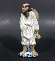 Vintage Balding Man with a Beard in a White Robe With a Tan Hat Ceramic Figurine - Treasure Valley Antiques & Collectibles