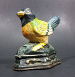 Antique Metalware Cast Iron Painted Yellow and Green Black Headed Song Bird Door Stop - Treasure Valley Antiques & Collectibles