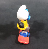 1997 Schleich Germany Peyo Puffo Smurf Snowboarder 2 3/8" PVC Figurine - Made in Portugal