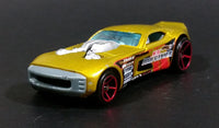 2007 Hot Wheels Nitro Door Slammer Aston Martin Metalflake Gold Die Cast Toy Race Car - Treasure Valley Antiques & Collectibles
